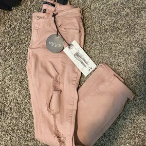 Tanish pink jeans never worn